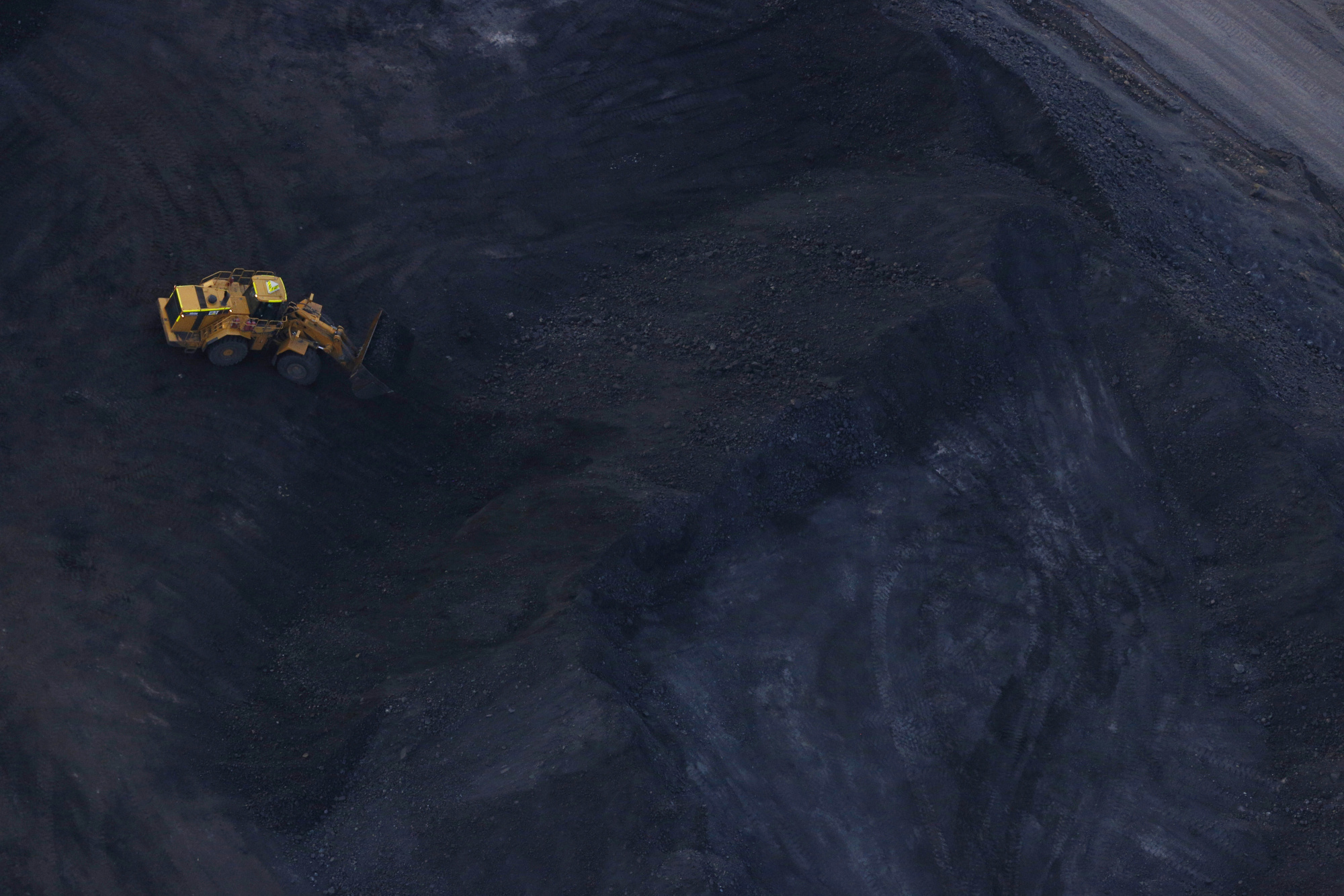 A front loader moves coal at&nbsp;the Peabody Energy Somerville Central surface mine in Oakland City, Indiana.