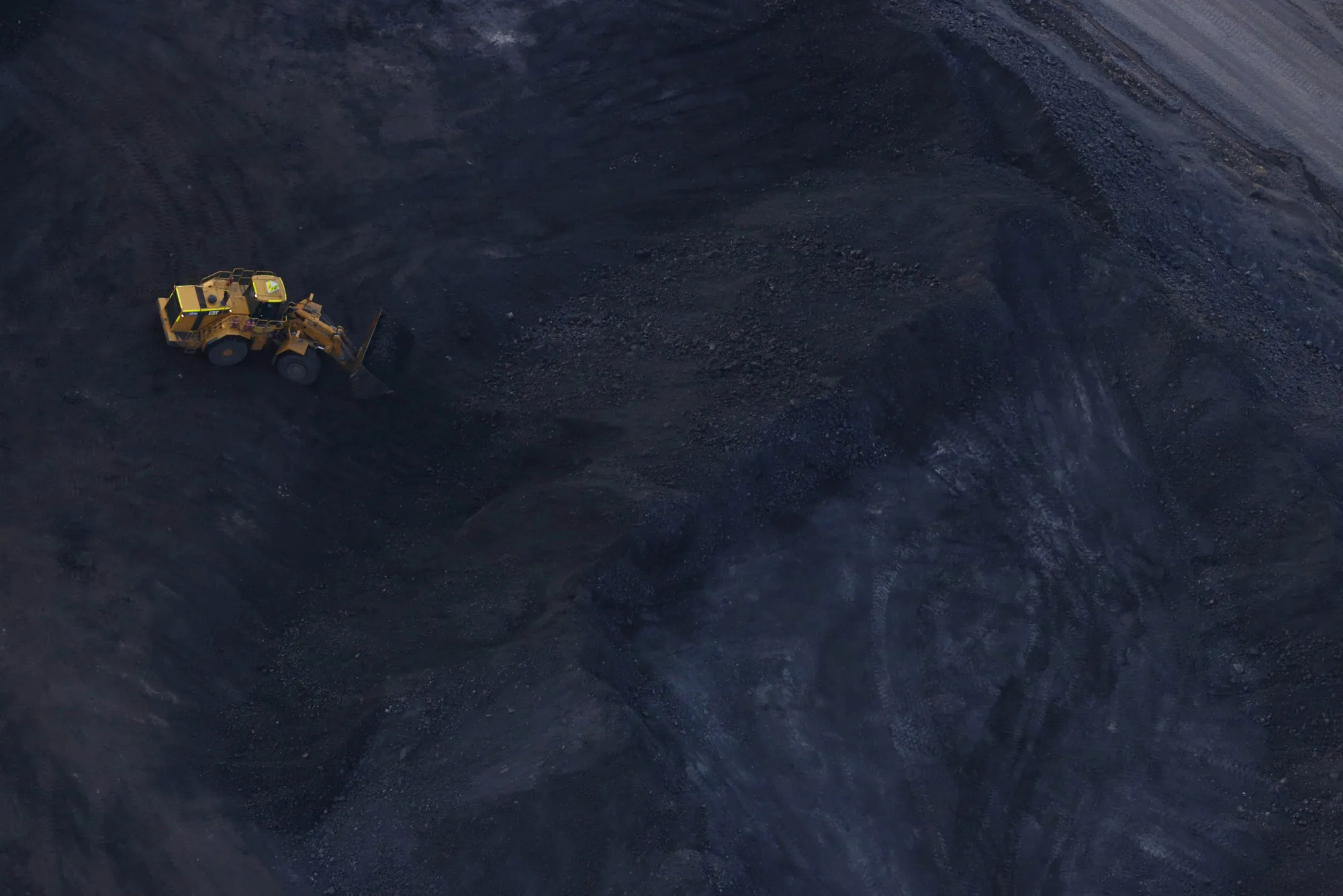 A front loader moves coal at&nbsp;the Peabody Energy Somerville Central surface mine in Oakland City, Indiana.