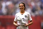 Carli Lloyd poses with the Golden Boot during the FIFA Women's World Cup in Vancouver on July 5, 2015. Photograph: Dennis Grombkowski/Getty Images
