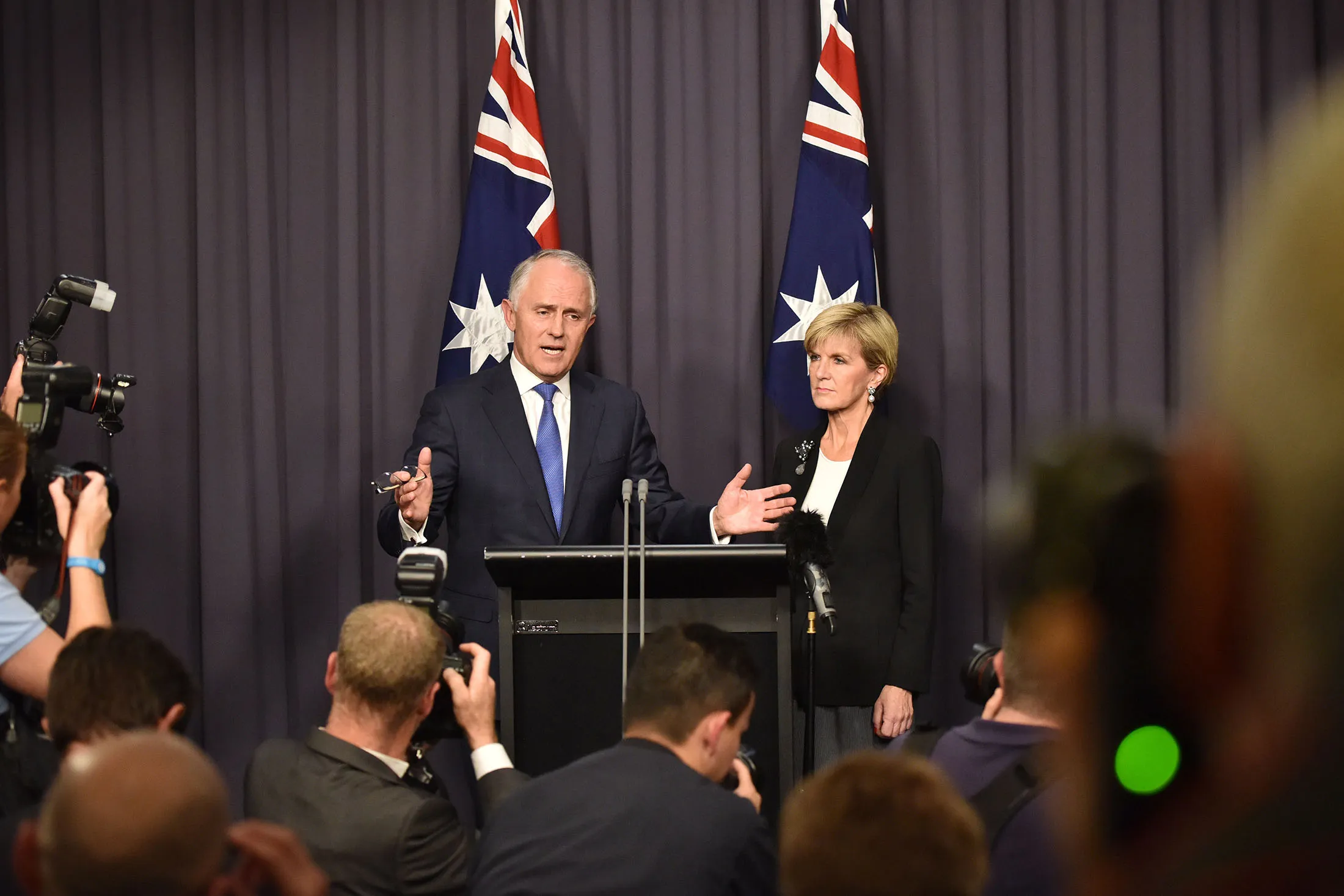 Malcolm Turnbull, Australia's prime minister, left, speaks during a news conference alongside Julie Bishop, Australia's foreign minister on Monday.
