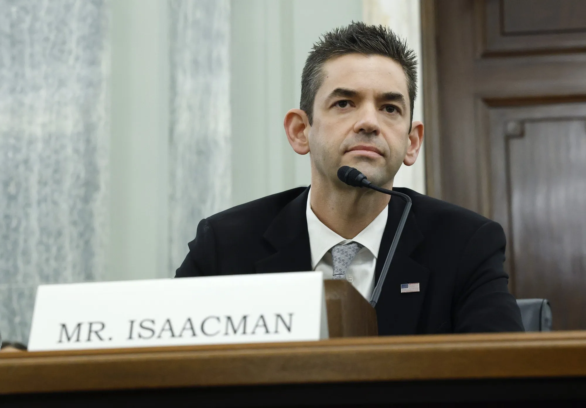 Jared Isaacman speaks to senators during his first confirmation hearing in Washington on April 9.