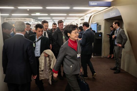 Carrie Lam Courts Davos Elites With Dim Sum to Sell Hong Kong