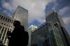 The Citigroup tower, right, in the Canary Wharf business, financial and shopping district of London.