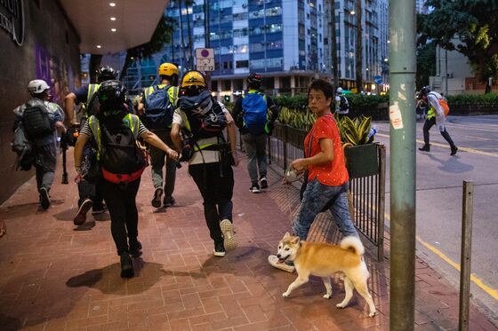 Hong Kong Holiday Protests Small as Stricken City Cleans Up