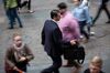 A pedestrian carries a briefcase while walking along Wall Street near the New York Stock Exchange (NYSE) in New York, U.S., on Monday, Sept. 24, 2018. U.S. stocks fell to their lows of the day after reports that Deputy Attorney General Rod Rosenstein will leave his post.