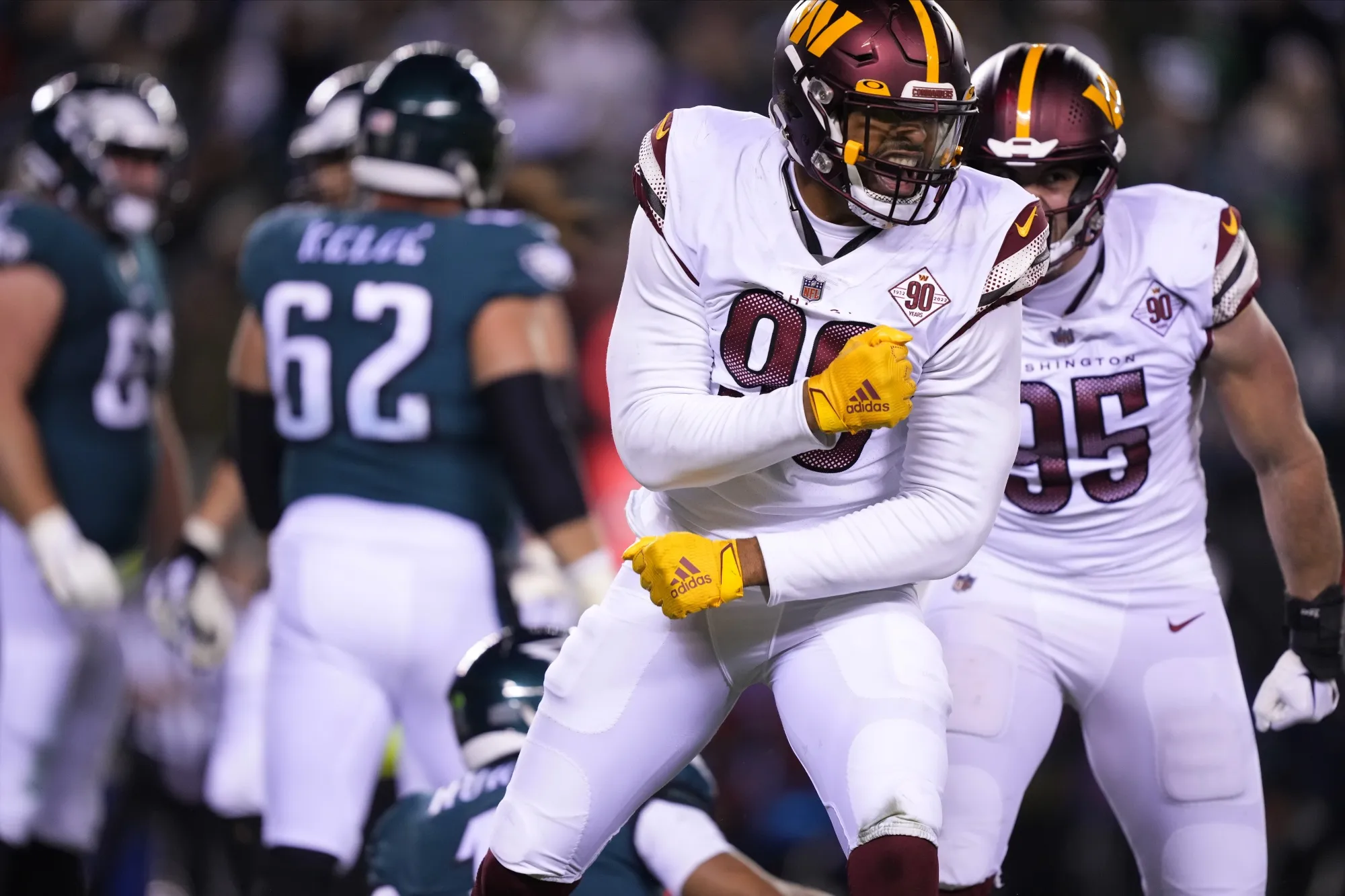Washington Commanders defensive end Montez Sweat reacts after sacking Philadelphia Eagles quarterback Jalen Hurts during the second half of an NFL football game, Monday, Nov. 14, 2022, in Philadelphia. (AP Photo/Matt Rourke)