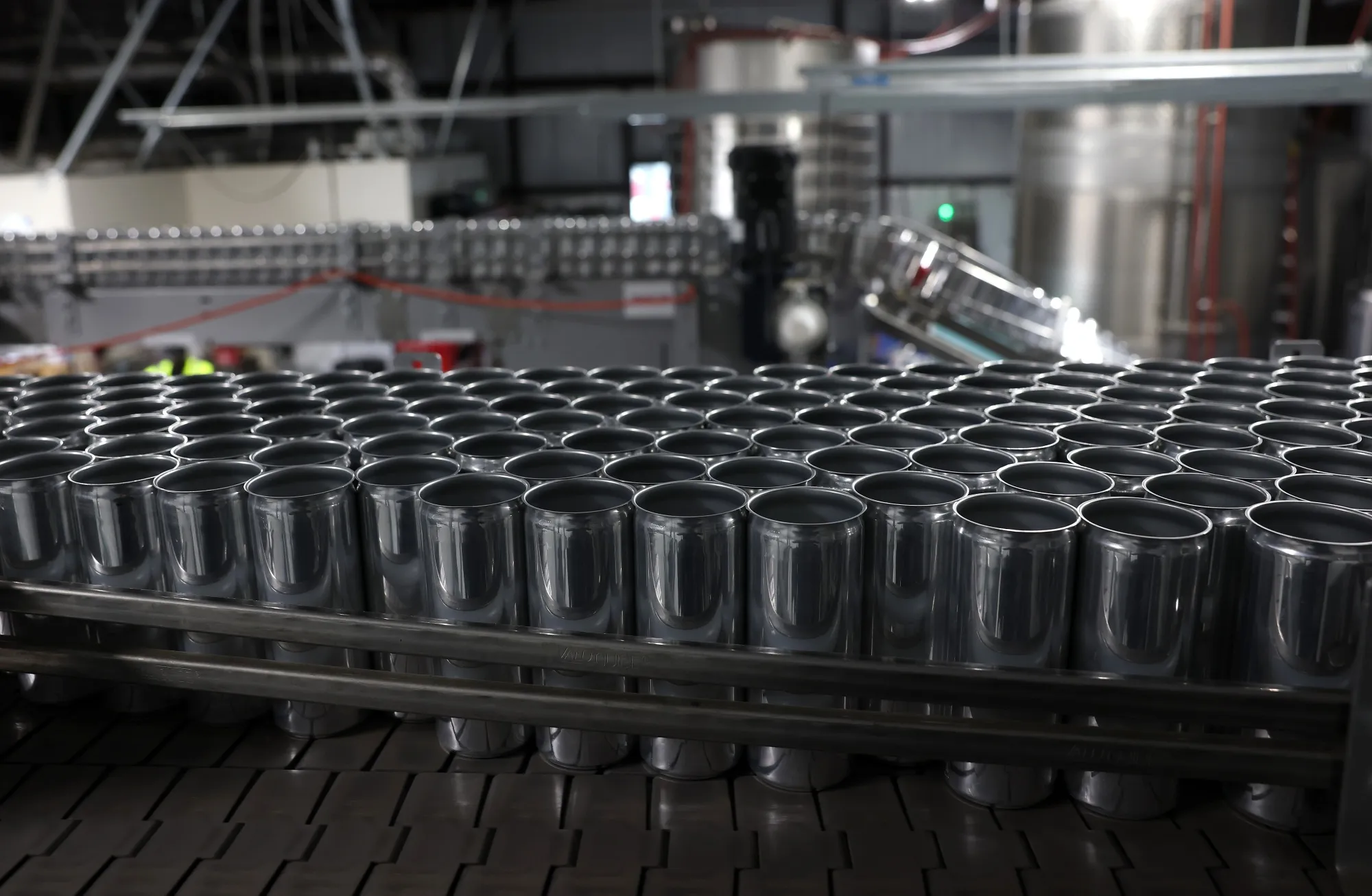 Empty aluminum cans move on an assembly line before being filled in Sacramento, California.&nbsp;