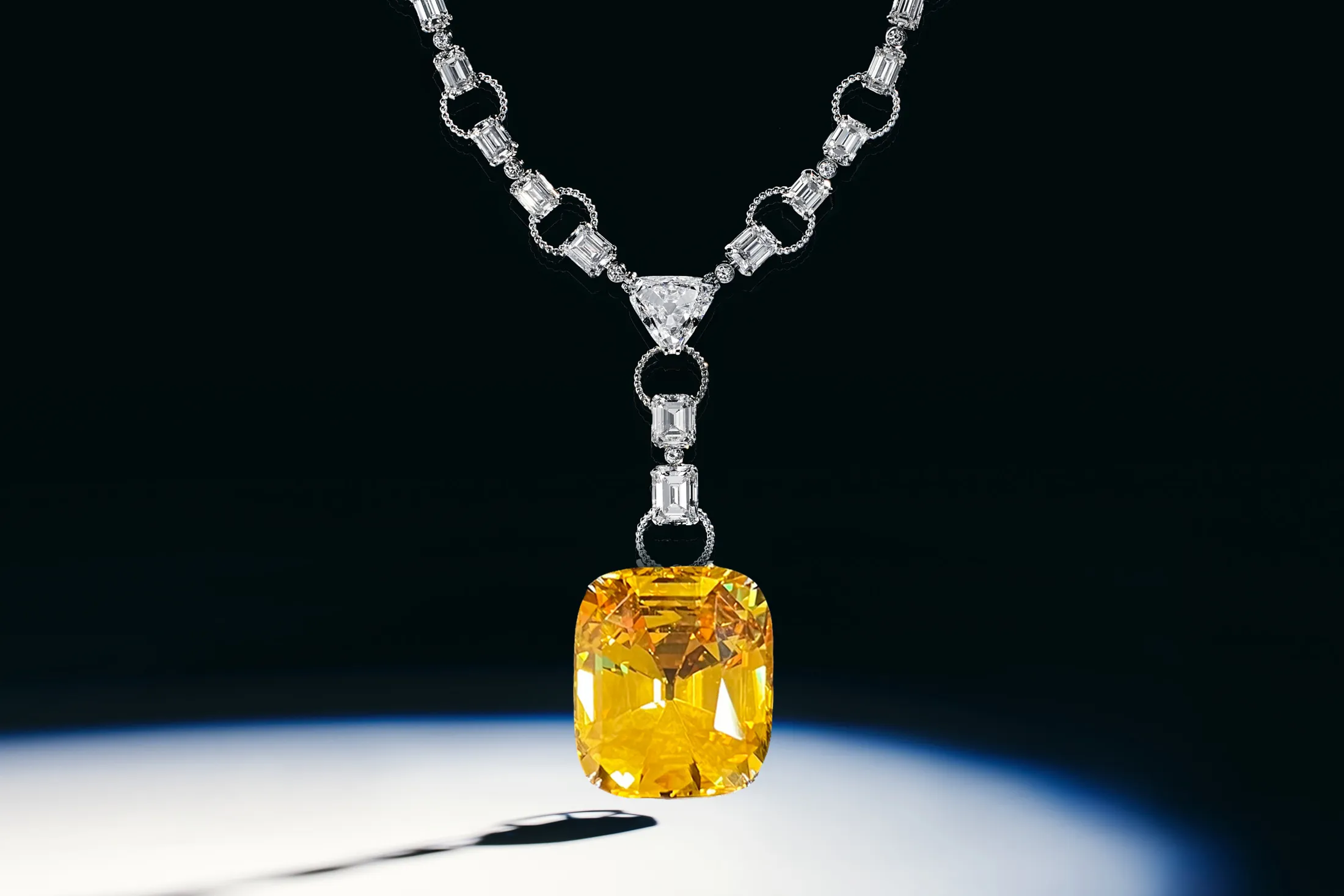 A yellow sapphire that Reza cut down from 197 carats to improve its color.