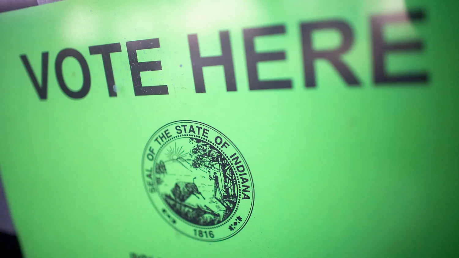 A sign hangs on a polling place door on May 3, 2016, in Whiting, Indiana.
