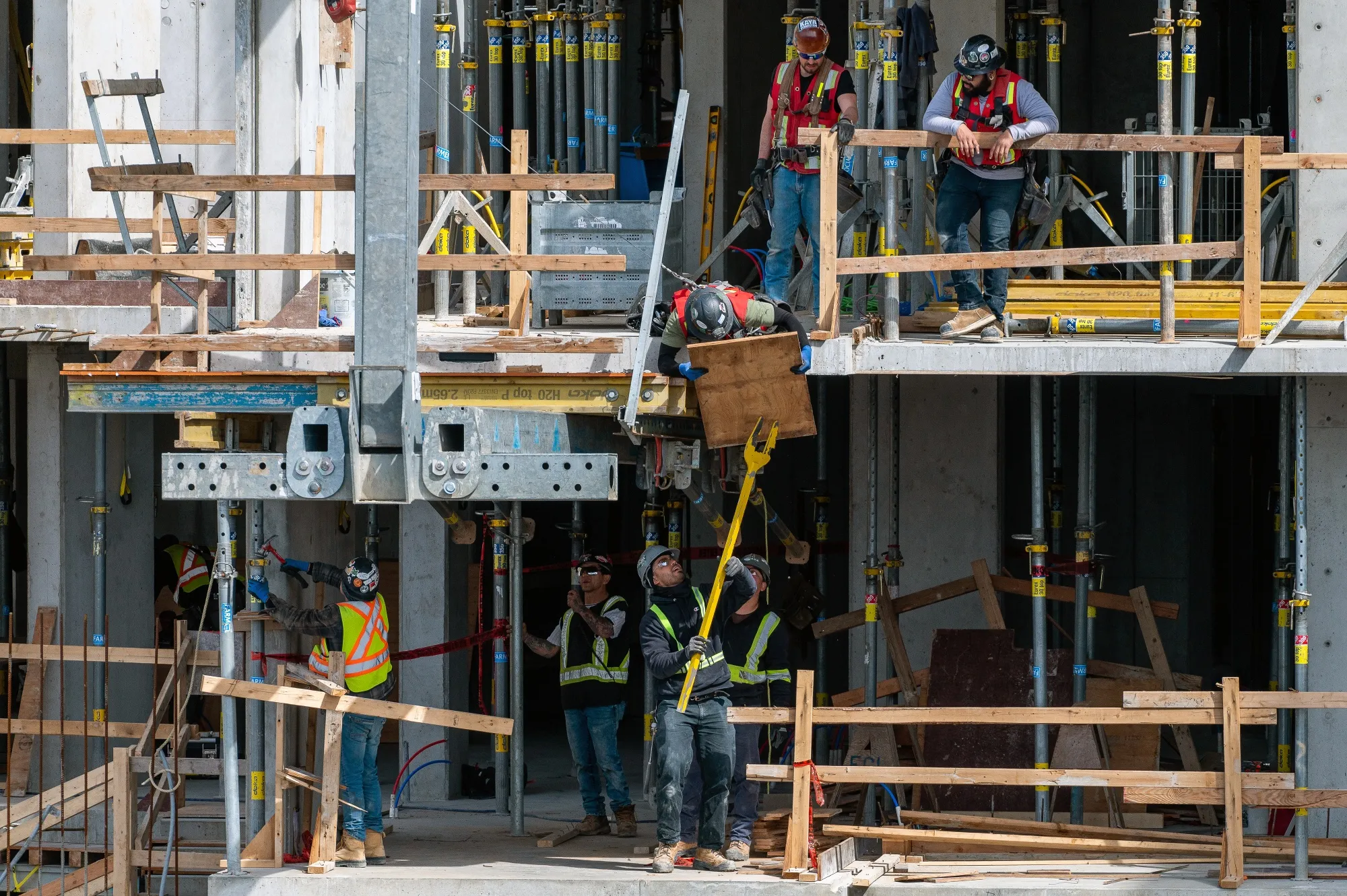 Construction workers on condo building in downtown Victoria, British Columbia last month