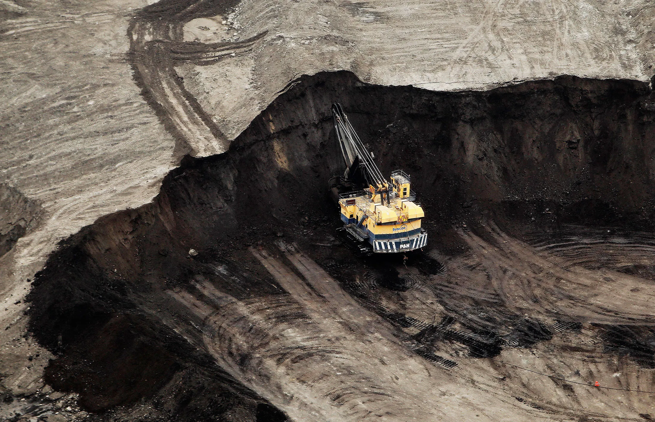 Oil sands mining operation near Fort McMurray, Alberta, Canada.
