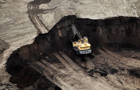 Oil sands mining operation near Fort McMurray, Alberta, Canada.