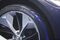 The wheel on a Jaguar Land Rover Automotive I-Pace Electric Concept luxury sport utility vehicle (SUV) is seen during an event in Los Angeles, California, U.S., on Sunday, Nov. 13, 2016. Jaguar's working on its first electric car, a sport utility vehicle with a large glass roof and cutouts in the hood, as the luxury brand joins the race to meet ever-tightening emissions rules. Photographer: Patrick T. Fallon/Bloomberg