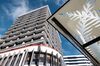 The Reserve Bank of New Zealand headquarters, left, stands in Wellington, New Zealand.