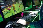 An attendee plays the Epic Games Inc. Fortnite video game during the E3 Expo in Los Angeles.