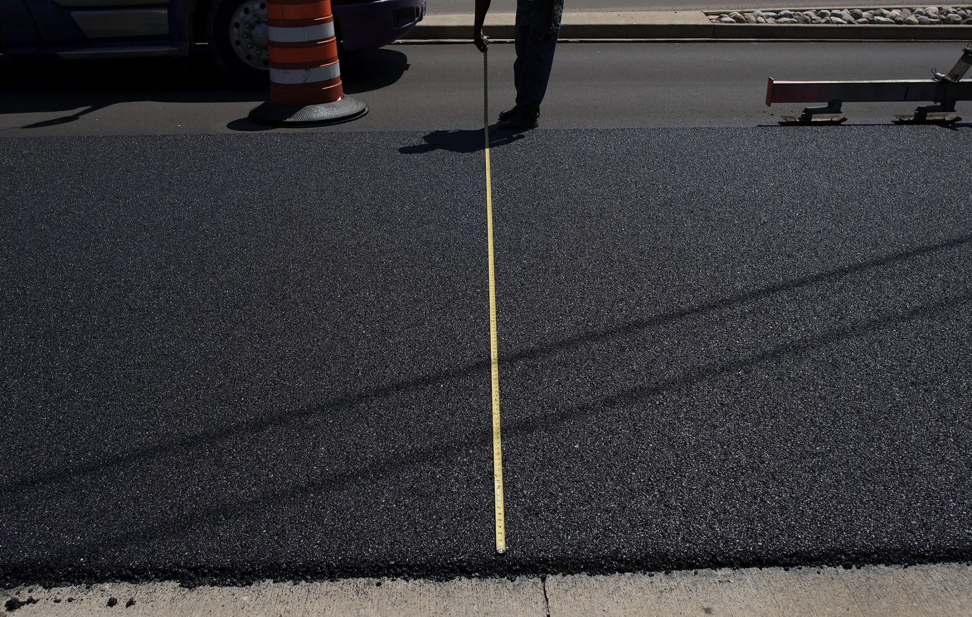 Freshly laid asphalt on a state highway in Streator, Illinois,
