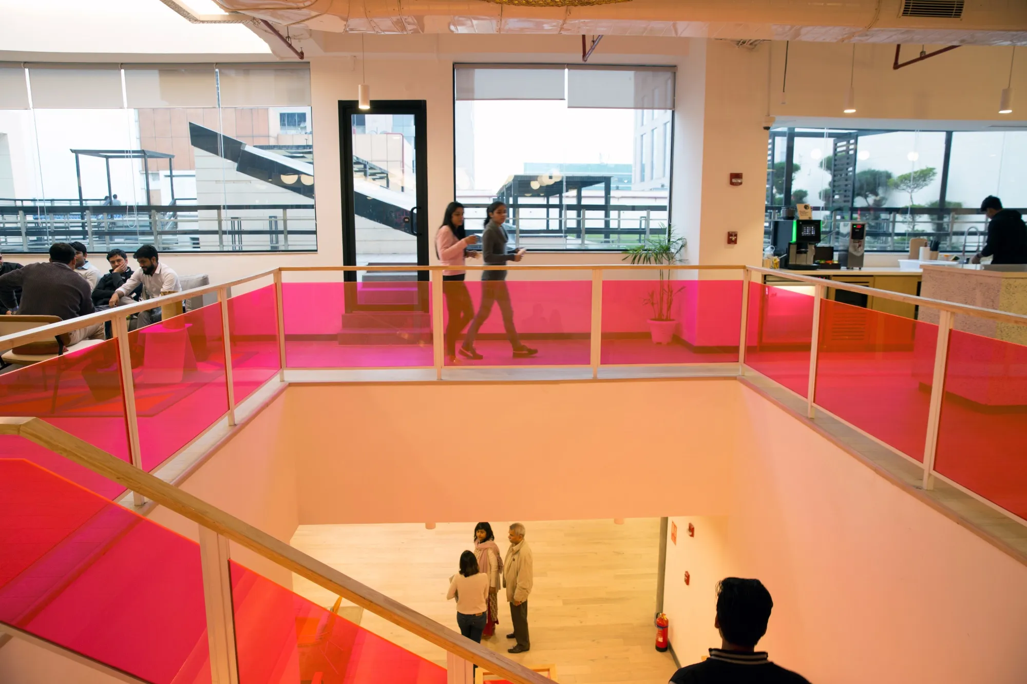People walk through the WeWork Cos. 32nd Milestone co-working space in Gurugram, India, on Monday, Feb. 18, 2019.&nbsp;