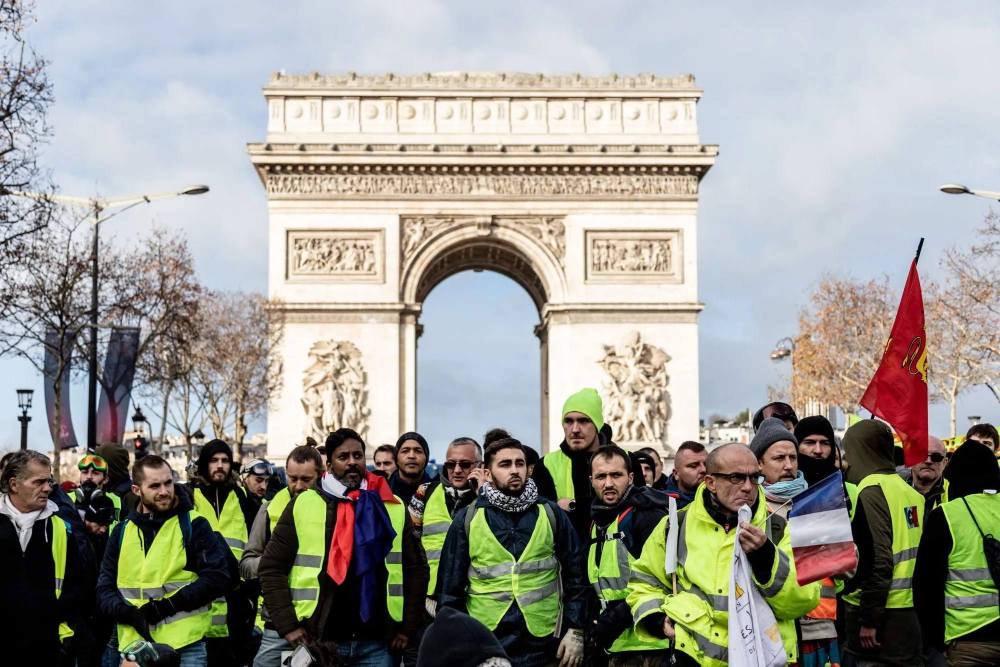 Demonstrators&nbsp;protest in front of the Arc de Triomph in Paris Dec. 8.