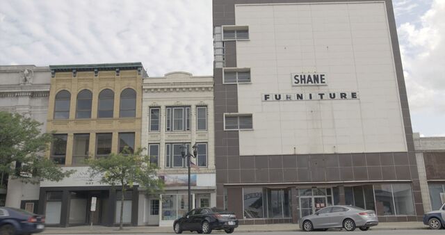 The now-demolished Shane Furniture building in downtown Elyria, Ohio. 