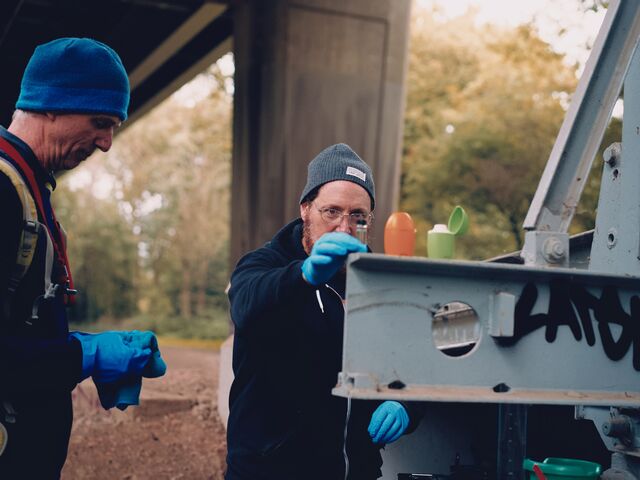 Volunteers test for water pollution at the River Brent in Ealing.