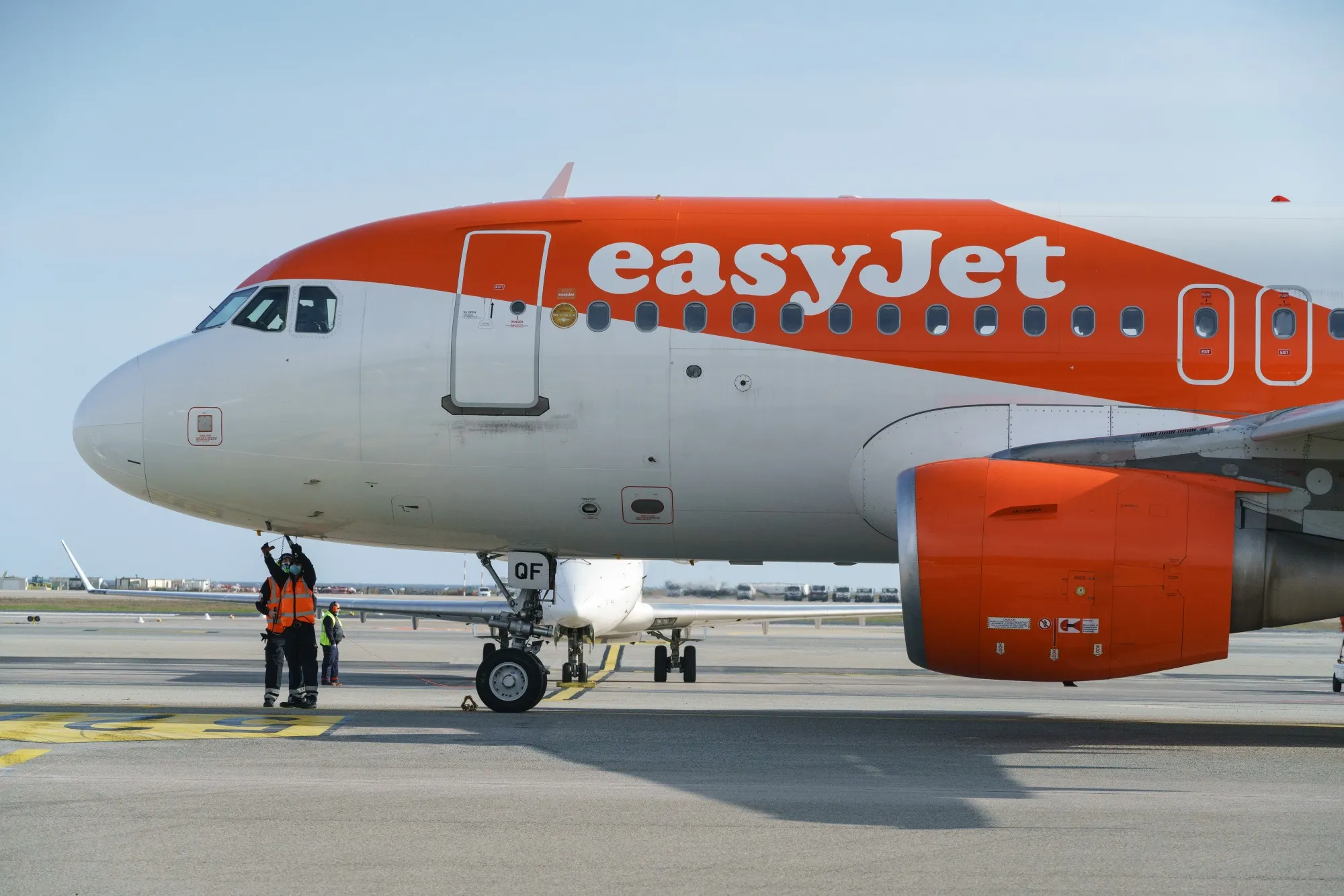 Ground crew inspect the underside of an EasyJet&nbsp;passenger aircraft at Nice Cote d'Azur Airport, France.