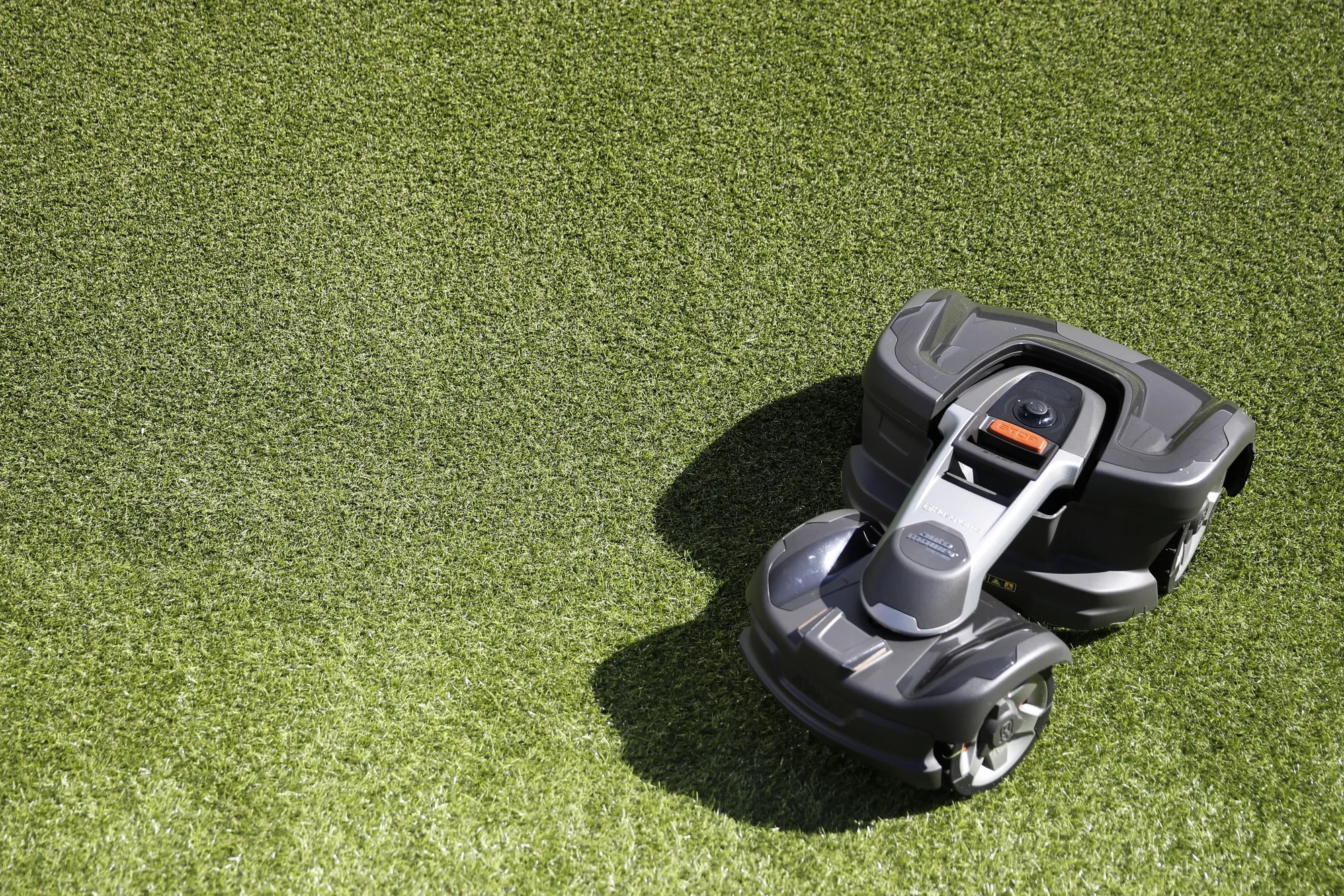 A Husqvarna AB robotic lawn mower.