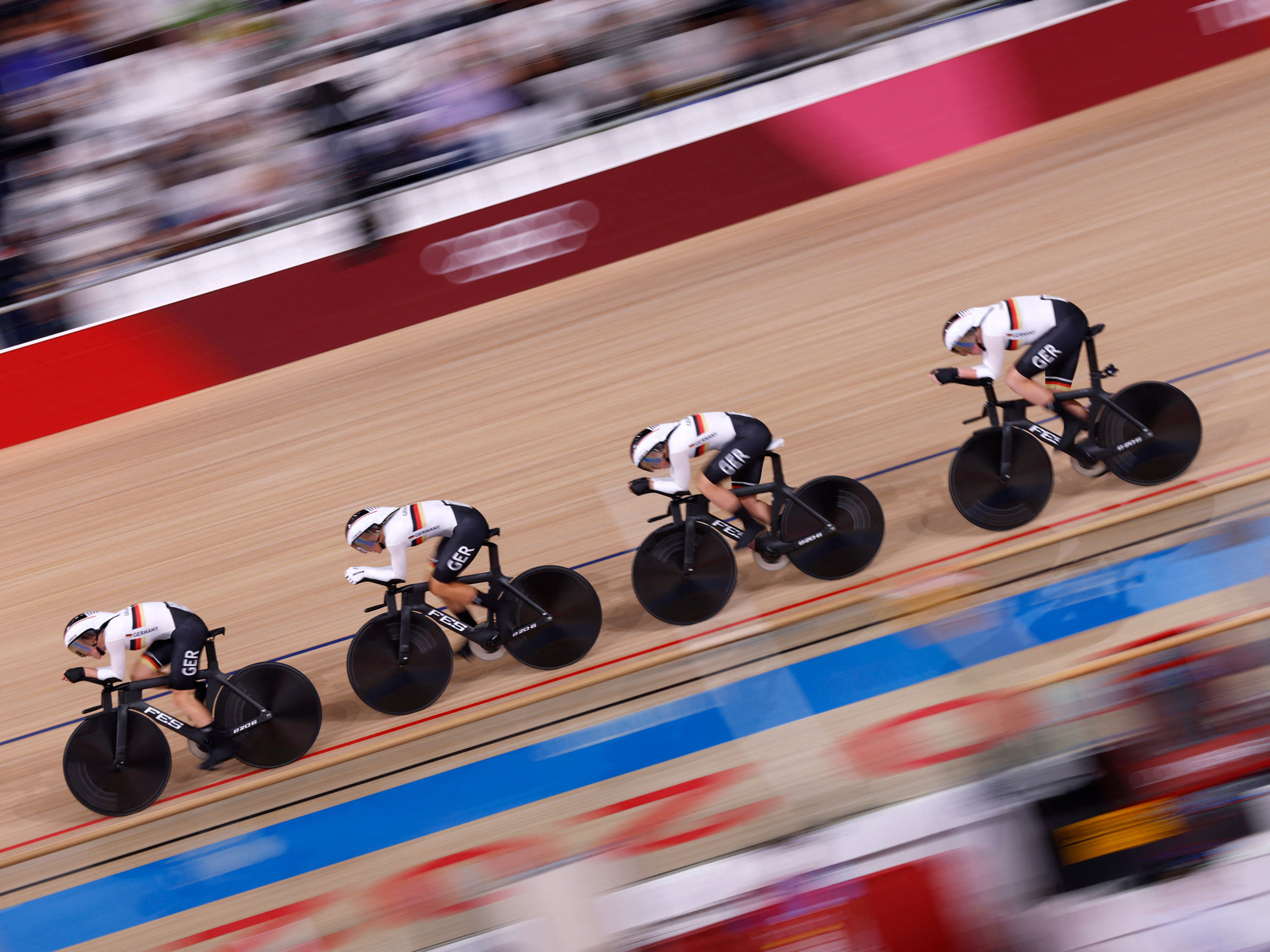 Germany compete&nbsp;in the women's track cycling team pursuit qualifying event on Aug. 2.