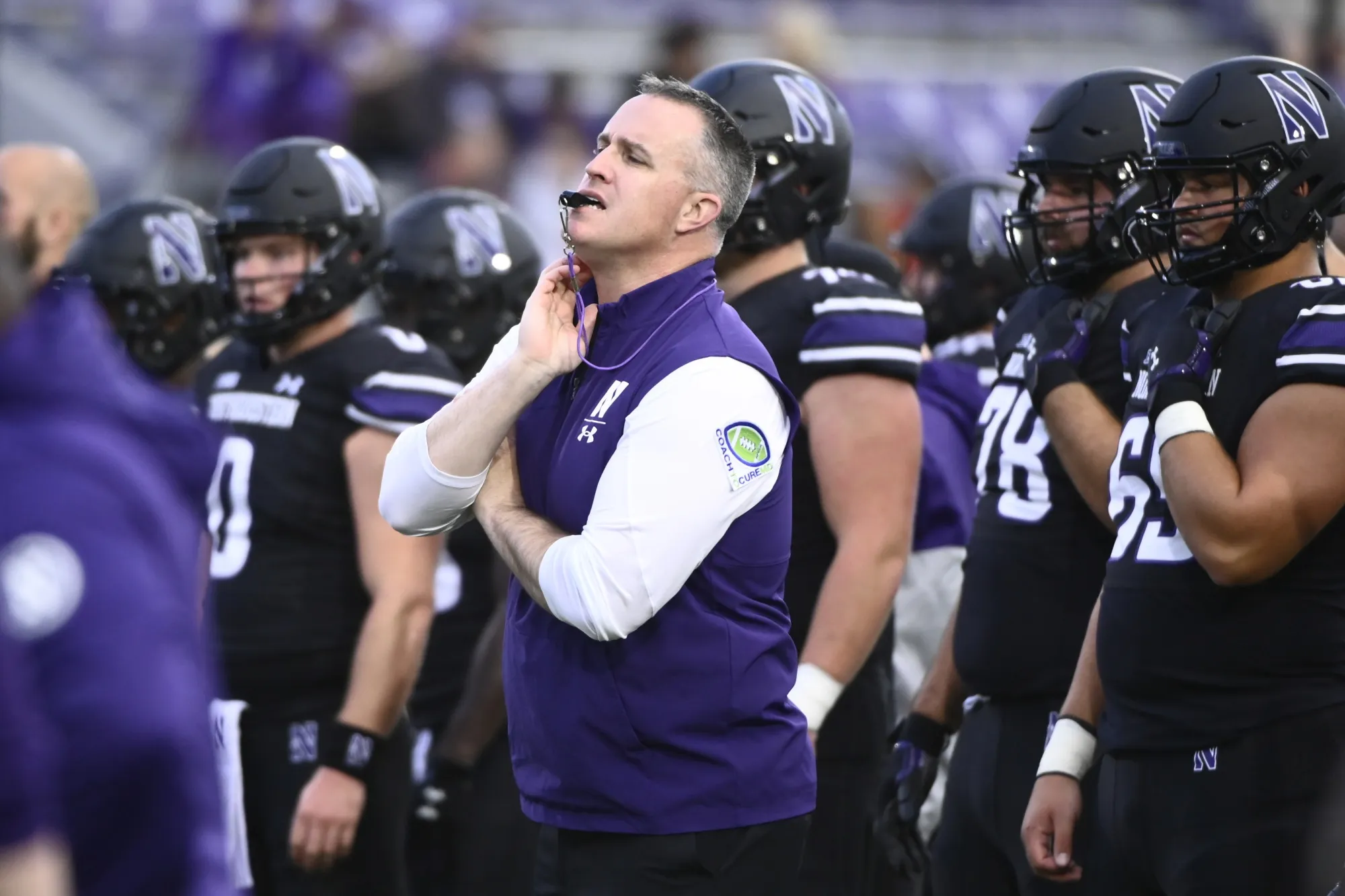 Northwestern head football coach Pat Fitzgerald directs the team before an NCAA college football game against Miami (Ohio) Saturday, Sept. 24, 2022, in Evanston, Ill. An attorney for former Northwestern football coach Pat Fitzgerald urged a judge Tuesday, Feb. 13, 2024, to move up the trial in a dispute over his firing, saying he can't get another major job until he puts a hazing scandal behind him.(AP Photo/Matt Marton, File)