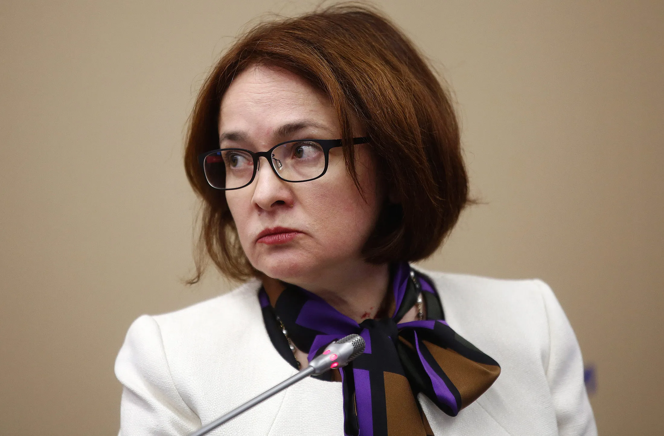 Elvira Nabiullina, governor of Russia's central bank, looks on during a panel session on the opening day of the St. Petersburg International Economic Forum 2016 (SPIEF) in Saint Petersburg, Russia, on Thursday, June 16, 2016. The 20th anniversary St. Petersburg International Economic Forum brings together heads of state and governments, political leaders, leading experts and global company executives and runs from June 16-18.
