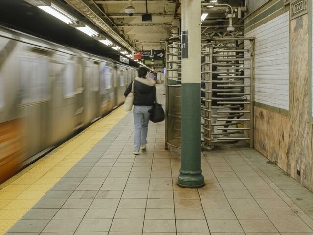 A commuter at the Wall Street subway station in New York. 
