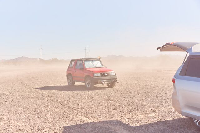 Geo Tracker car in desert sand.