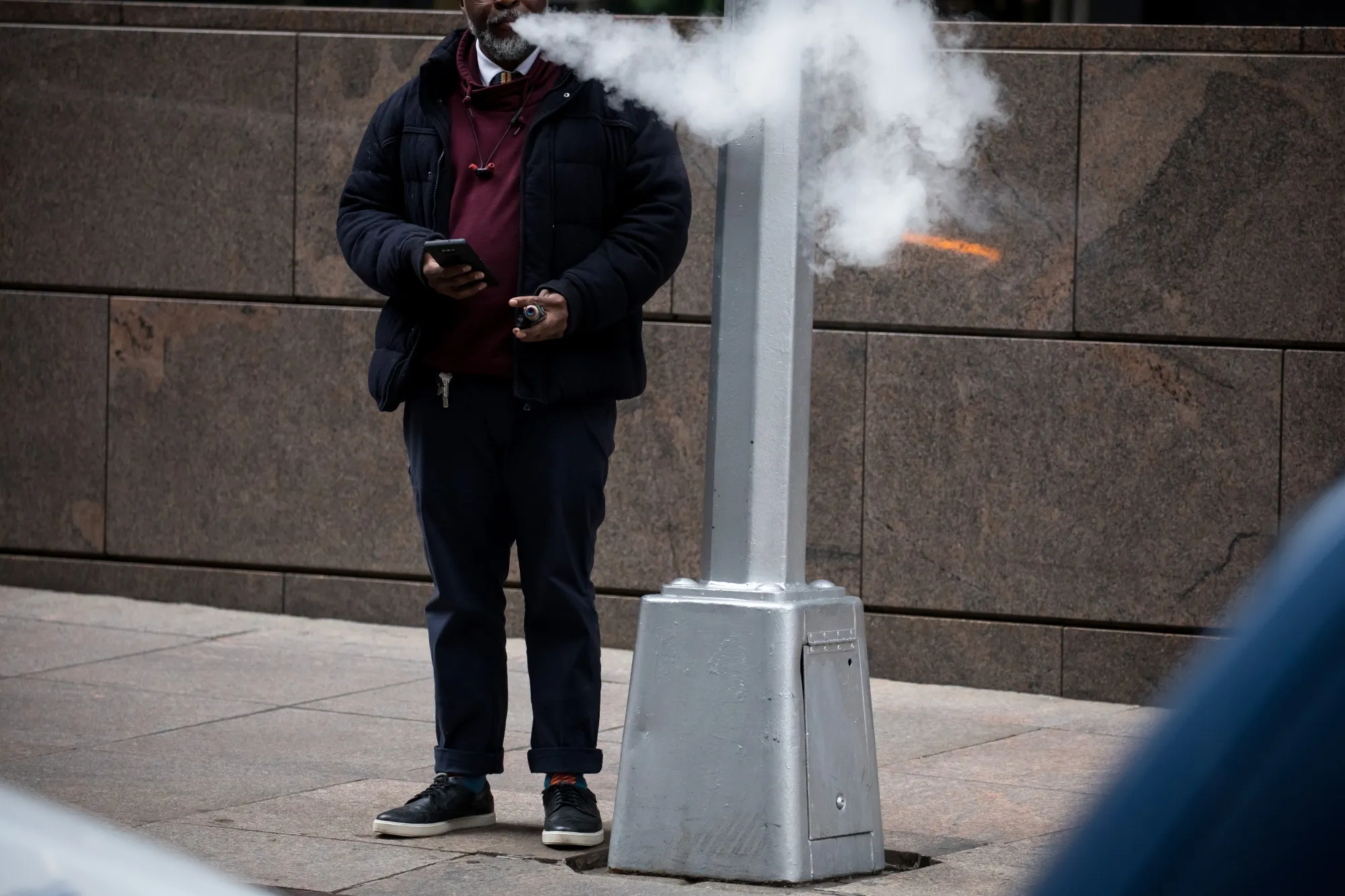 A person is seen vaping in New York on Jan. 14.