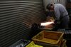 An employee makes hydraulic machine parts at a Noumi Industry Co. processing plant in Moriguchi, Osaka Prefecture, Japan.