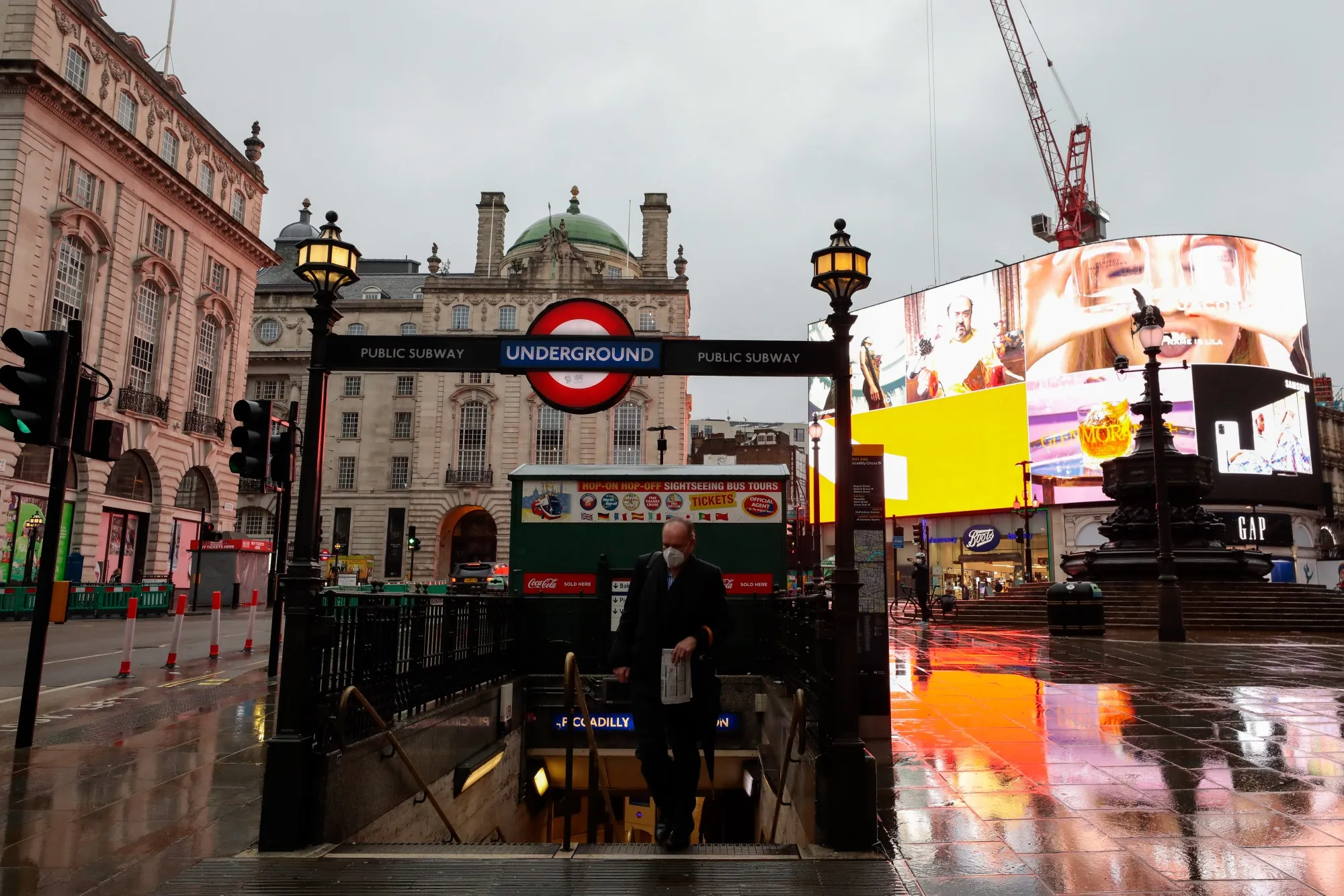 A commuter at a near empty Piccadilly Circus in London, U.K., on Dec. 21.