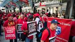 WASHINGTON, USA - MAY 19: Striking Verizon Wireless workers and members of the Communications Workers of America union march outside of a Verizon Wireless store on F Street in Washington, USA on May 19, 2016.
