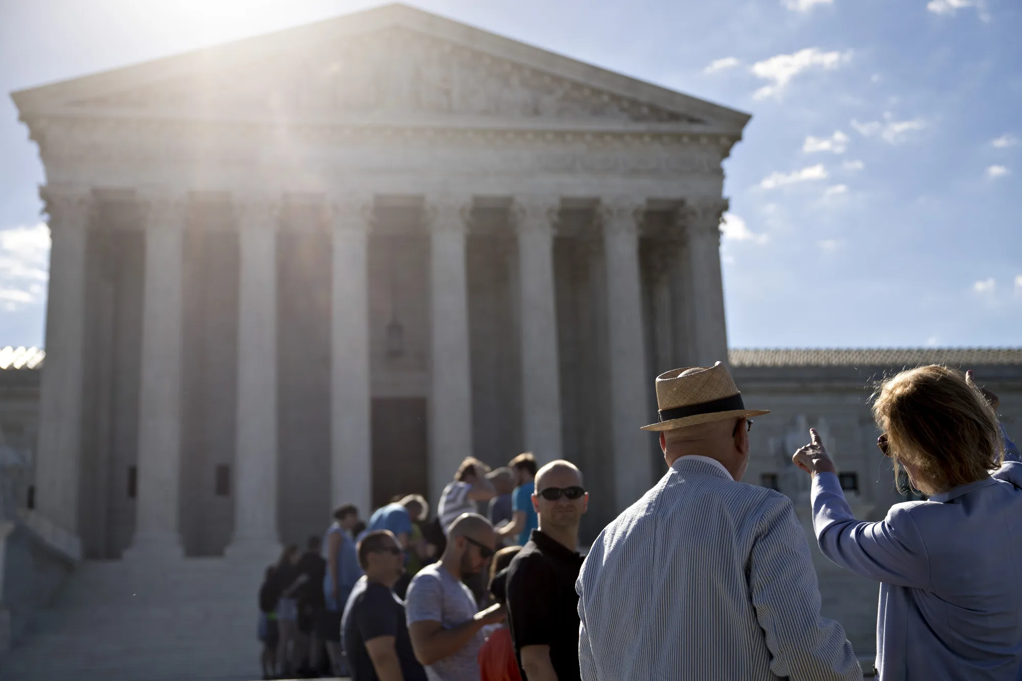 Visitors wait to enter the U.S. Supreme Court in Washington, D.C.