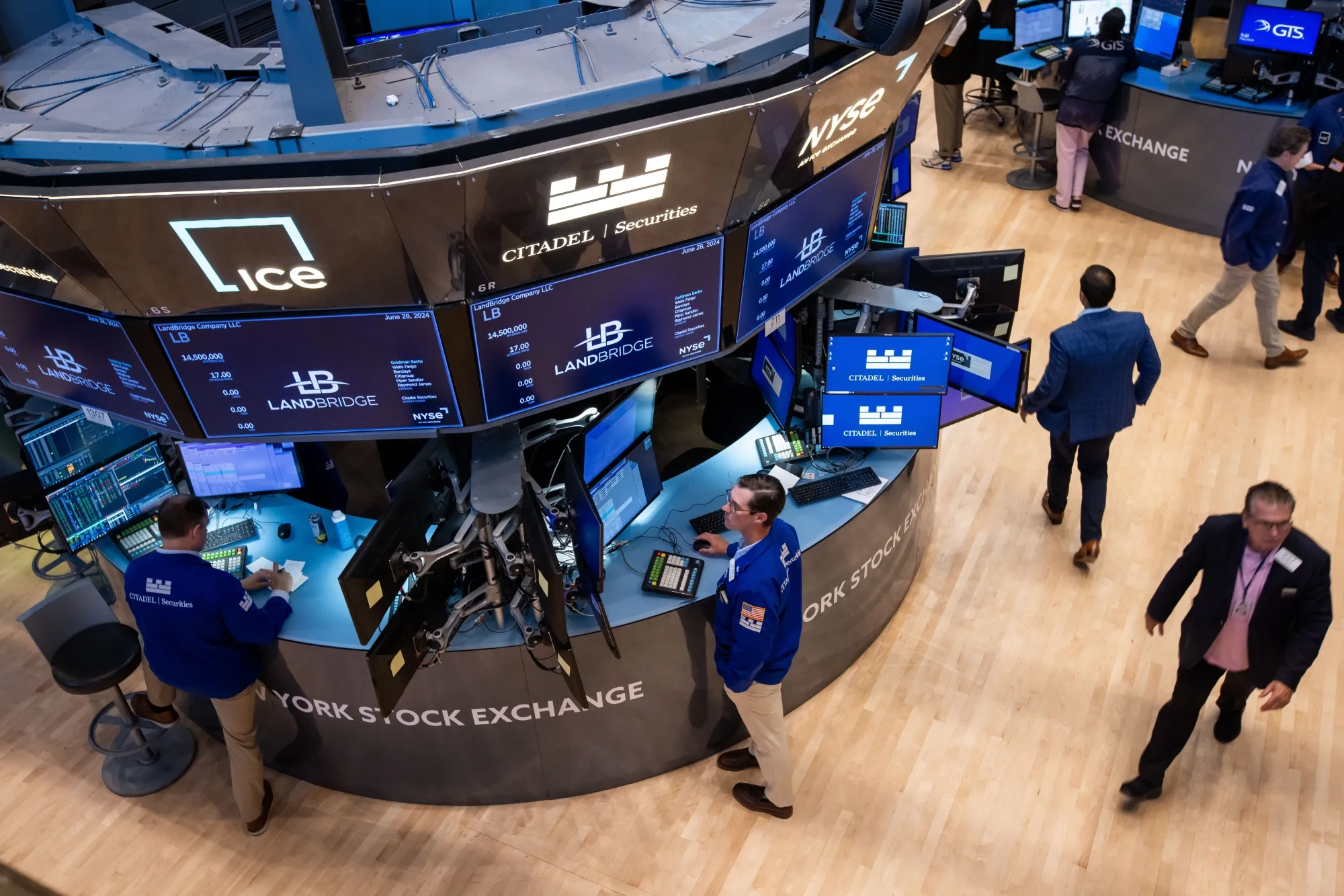 Traders work on the floor of the New York Stock Exchange.