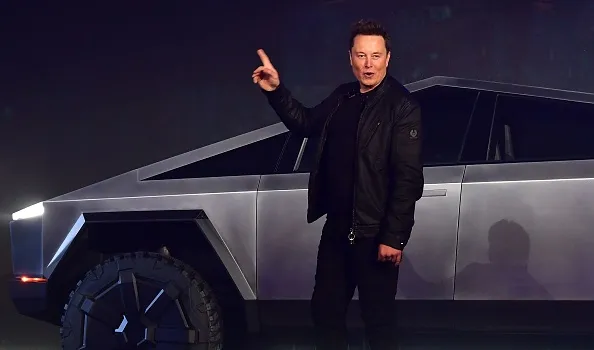 Elon Musk gestures while introducing the Tesla Cybertruck in Hawthorne, California on November 21, 2019.&nbsp;
