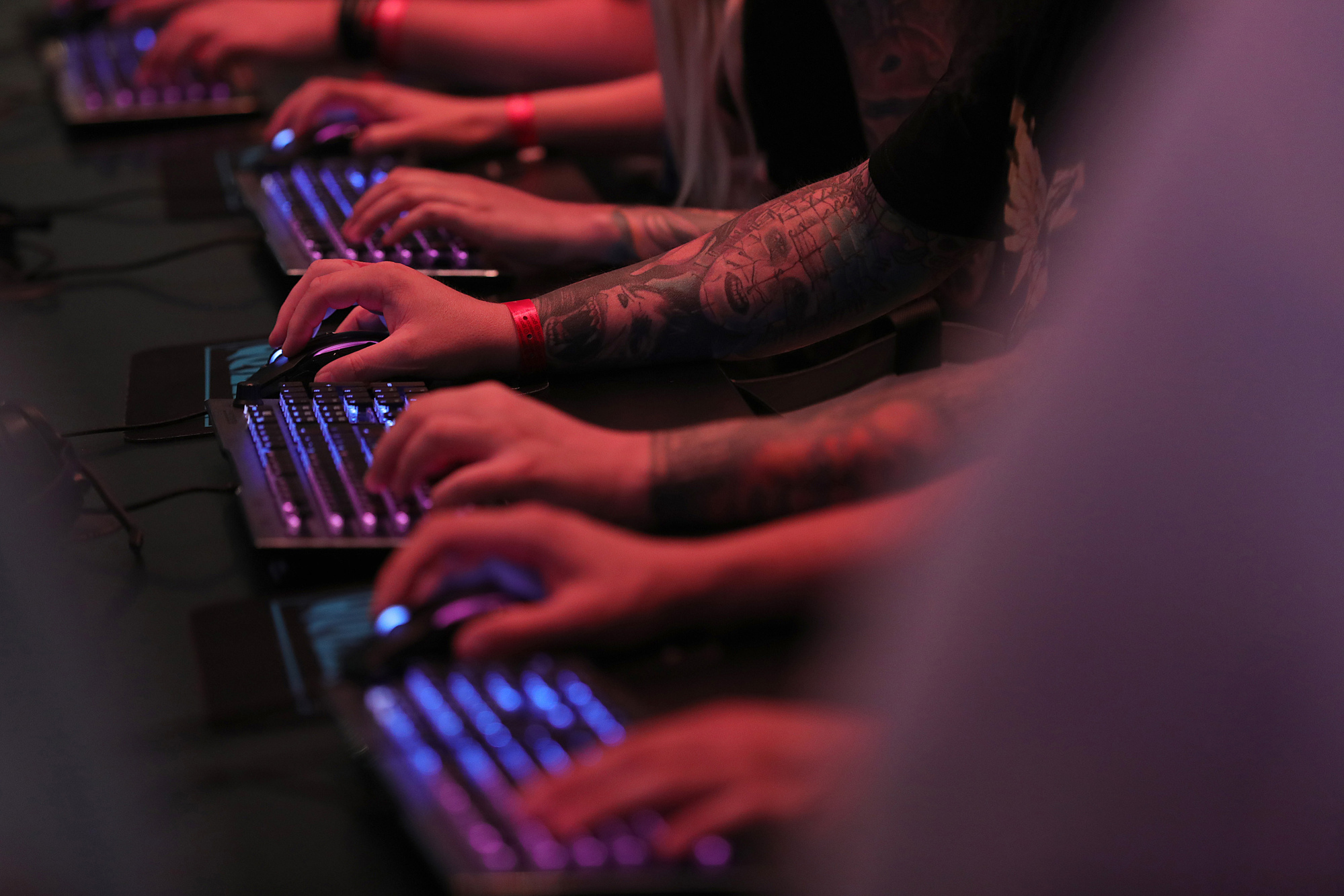 Gamers use keyboards to play a Microsoft Corp. XBox computer game at the Gamescom gaming industry event in Cologne, Germany, Tuesday, Aug. 21, 2018.