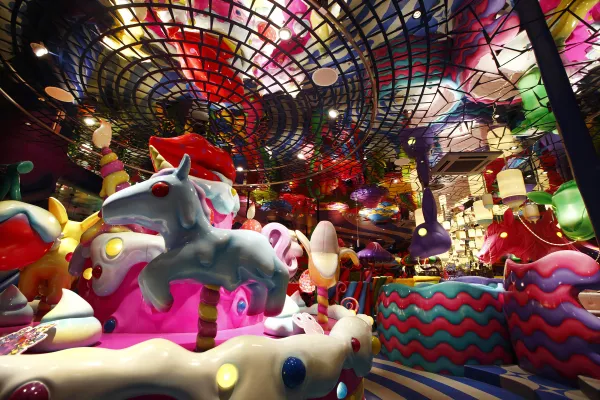 The Sweets Go Round merry-go-round, left, stands at the entrance to the Kawaii Monster Cafe.