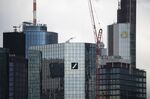 The Deutsche Bank AG headquarters, left, stand alongside the Commerzbank AG headquarters in Frankfurt&nbsp;on&nbsp;March 18, 2019.&nbsp;