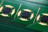 Computer chips sit on an electronic motherboard used for industrial cryptocurrency mining at the CrytoSpace conference in Moscow, Russia, on Friday, Dec. 8, 2017. CryptoSpace is Eastern Europe's largest conference dedicated to blockchain technology and cryptocurrencies and runs Dec. 8-9.