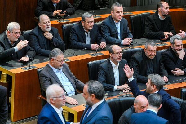 Hezbollah’s lawmakers attend a parliamentary session in Beirut on March 9, as Lebanese legislative elections originally scheduled for May were postponed.