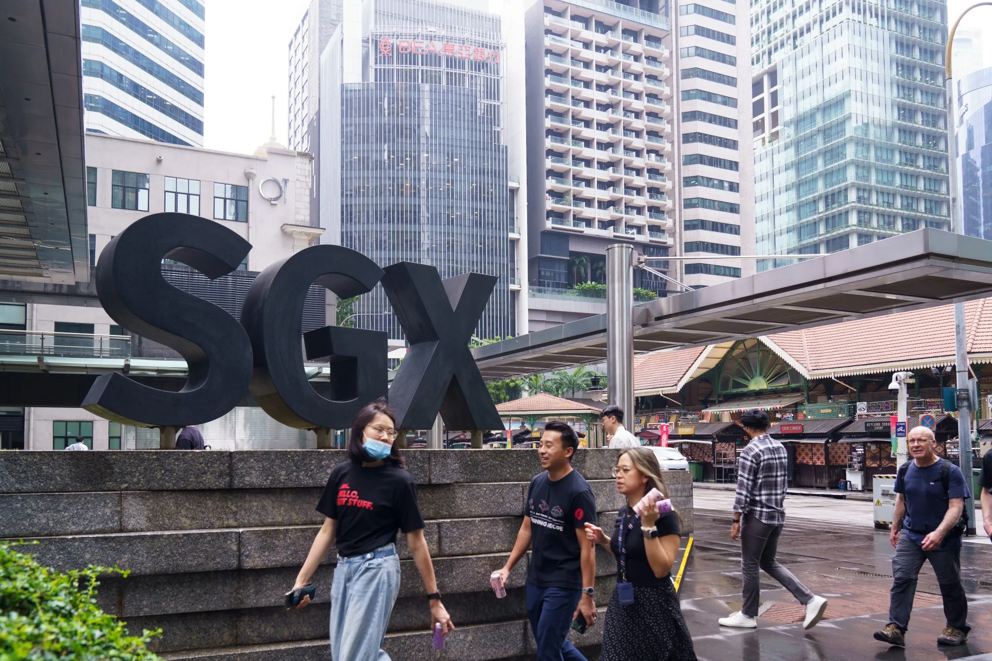 Signage for SGX Group outside the Singapore Exchange Ltd. stock exchange headquarters in Singapore.