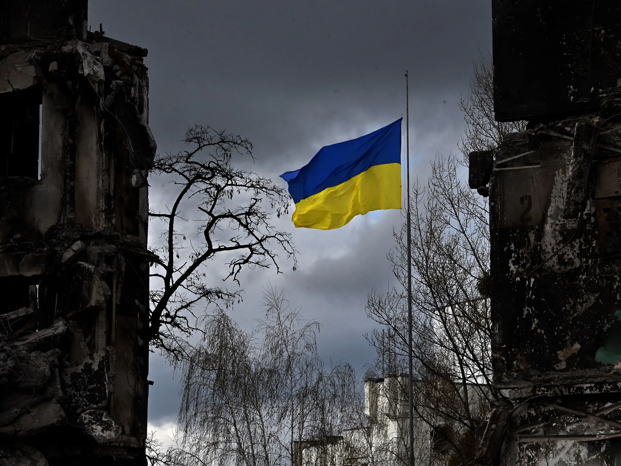 The Ukrainian flag flutters between destroyed buildings in the town of Borodianka in the Kyiv region on April 17.