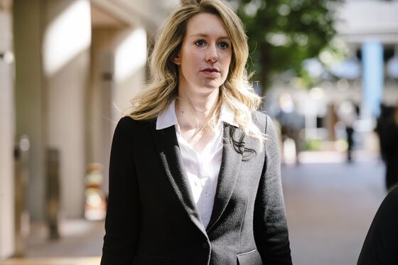 Elizabeth Holmes Takes Center Stage at Theranos Fraud Trial