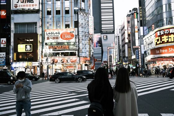 Japan’s Record Covid Cases Stoke Concern Economy Will Shrink or Lose Momentum