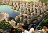 Visitors attend the annual summer housing fair in Shanghai, China on 04 July, 2011. According to surveys, housing prices in 8 of China's 10 largestes city has eased in the last month, signaling repeated government measures to cool the property market such as credit tightening are taking some effect. (Photo by In Pictures Ltd./Corbis via Getty Images)