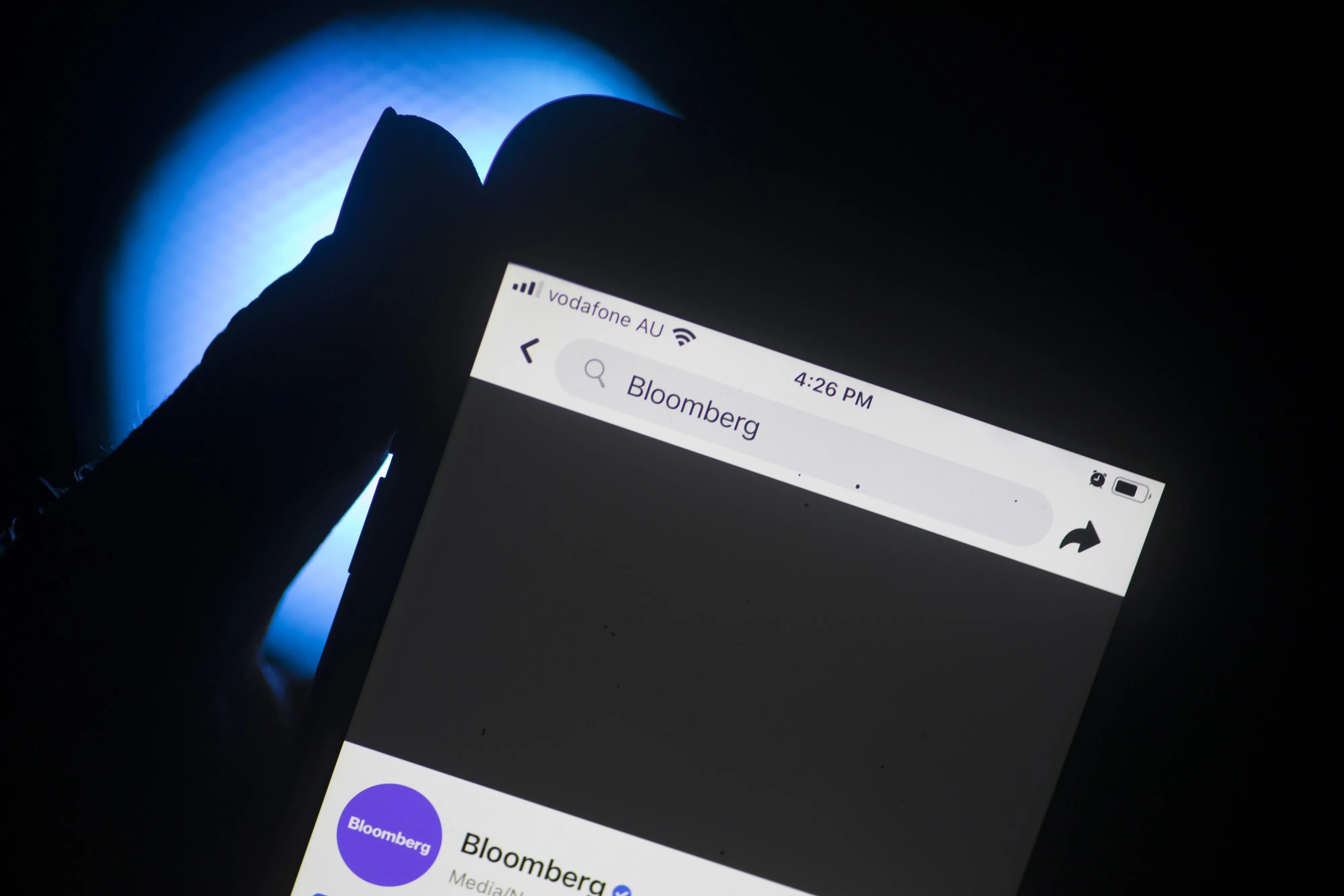 The Facebook page for Bloomberg News is blocked on a smartphone in Sydney after Australia passed a similar law in 2021.