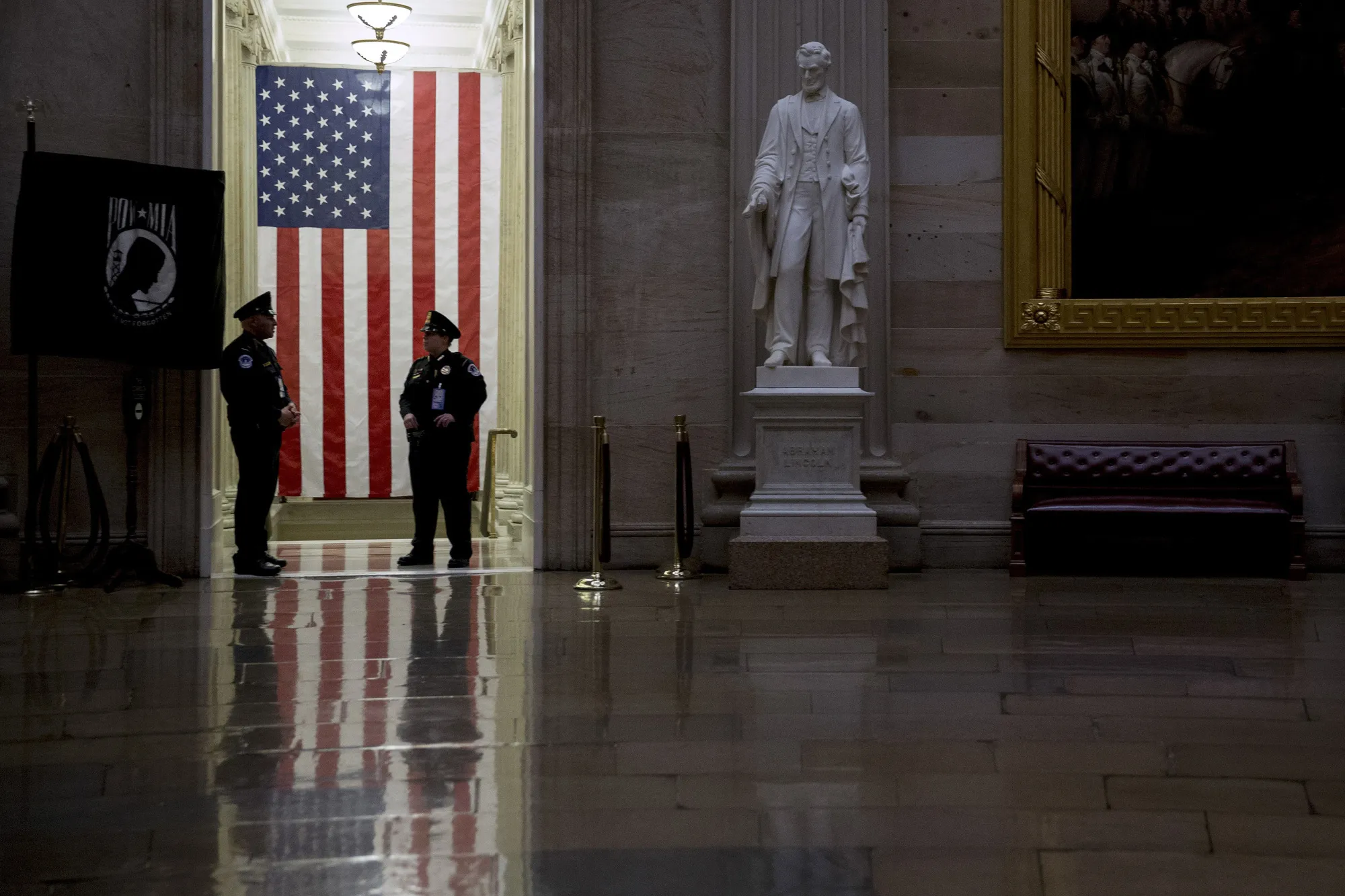 U.S. Capitol police officers stand on guard in the Capitol Building Rotunda in Washington, D.C.
